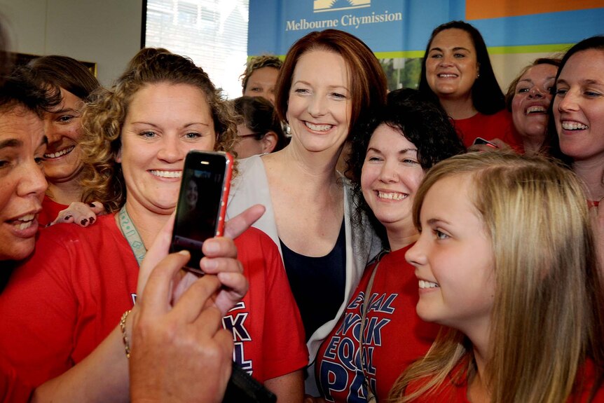 Julia Gillard takes part in a group photo