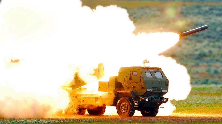 A rocket fires from a launcher.