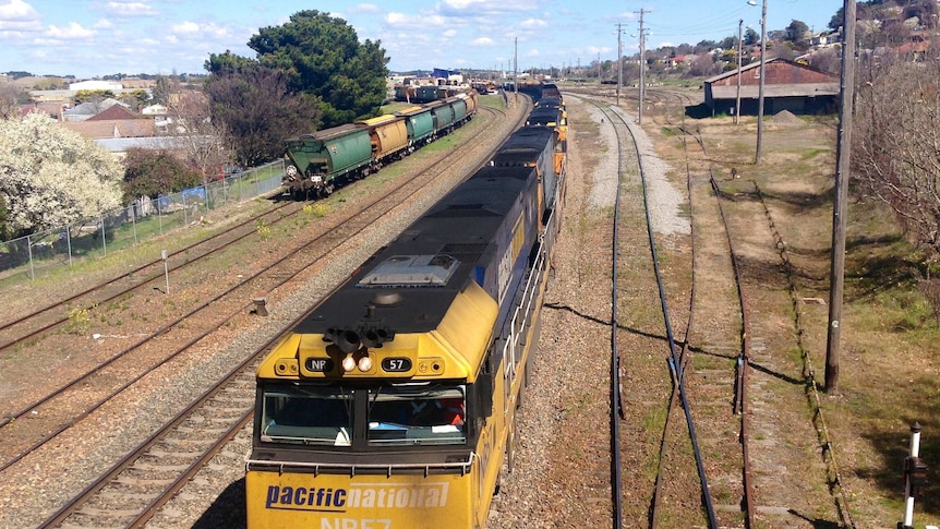 Pacific National freight train travelling through Goulburn in southern NSW. August 2013.