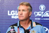 The coach of the Titans NRL team speaking to media