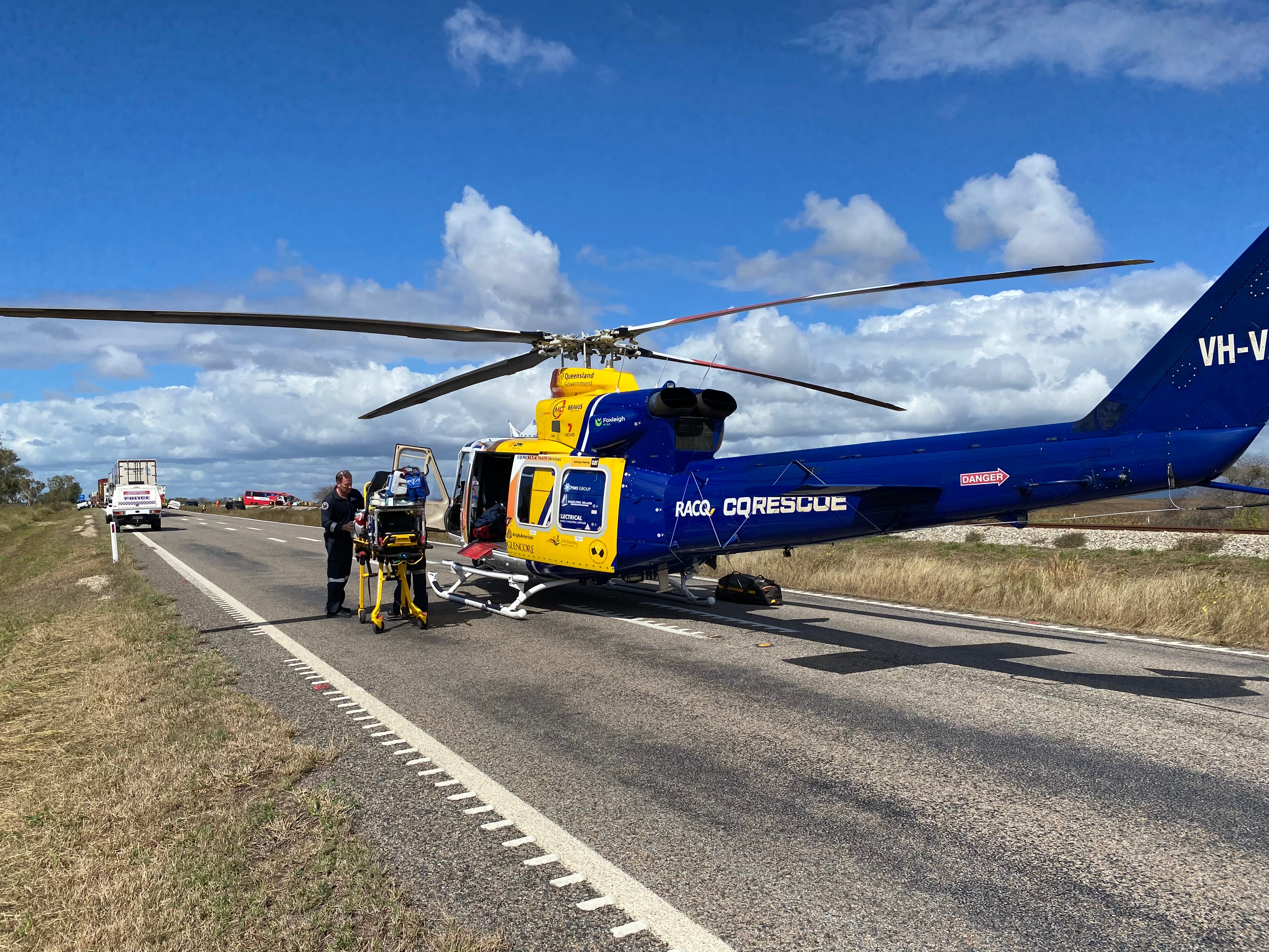 A rescue helicopter parked on a road 