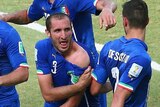 Chiellini signals to his shoulder after apparent Suarez bite