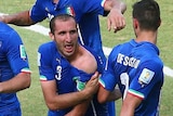 Chiellini signals to his shoulder after apparent Suarez bite