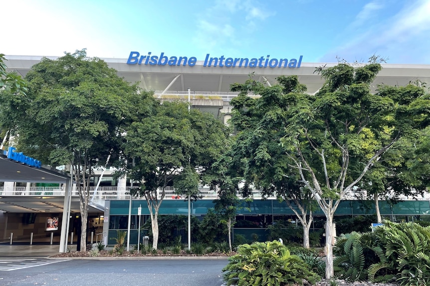 Sign and frontage of Brisbane International Airport on April 30, 2021.