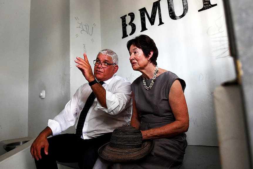 Commissioner Mick Gooda and Margaret White sit in a cell at the Don Dale Youth Detention Centre