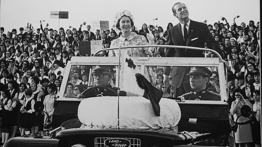 Black and white image of the Queen and Prince Philip in a Land Rover.