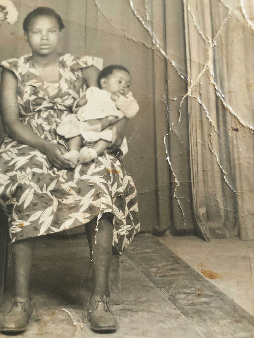 Lucy Gichuhi as a baby with her mother