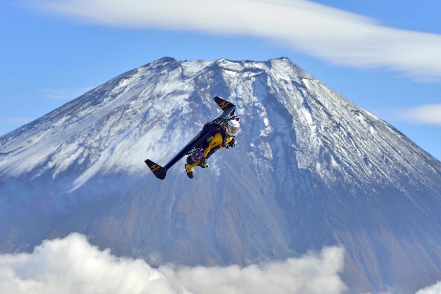 Yves Rossy flies near Mount Fuji using jet-engine powered wings.