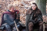 Ed Sheeran sits next to Masie Williams in Game of Thrones scene.