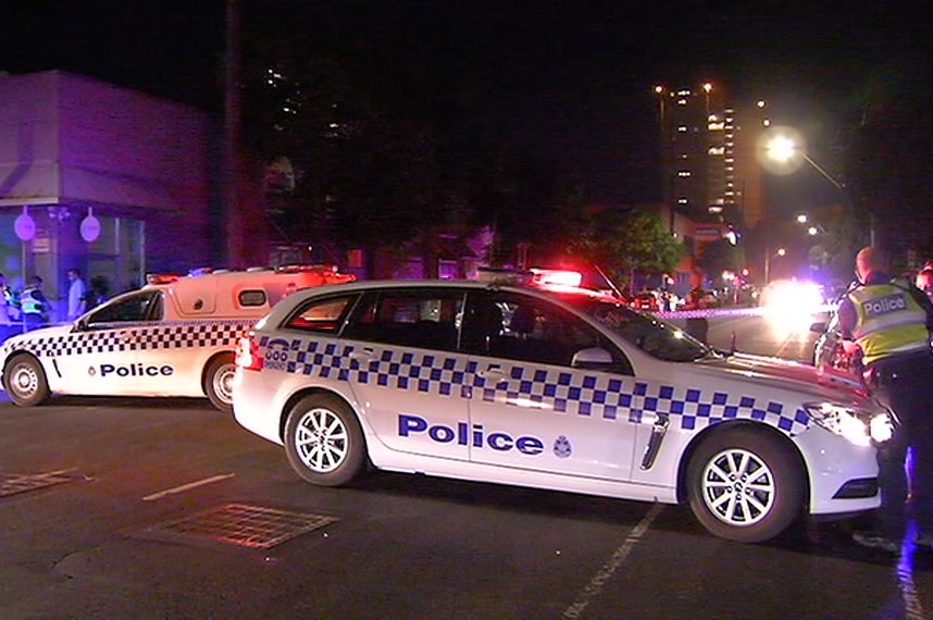 Police cars outside the boxing venue where the shooting took place.