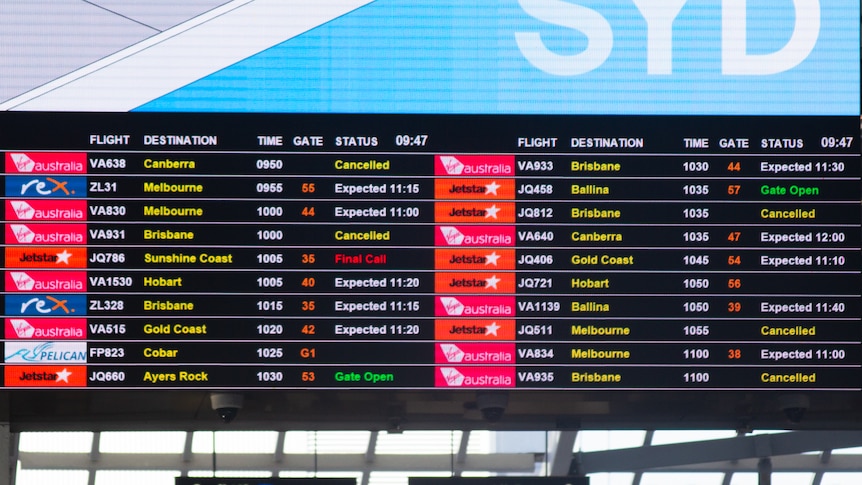 Sydney flight board with airline cancellations listed