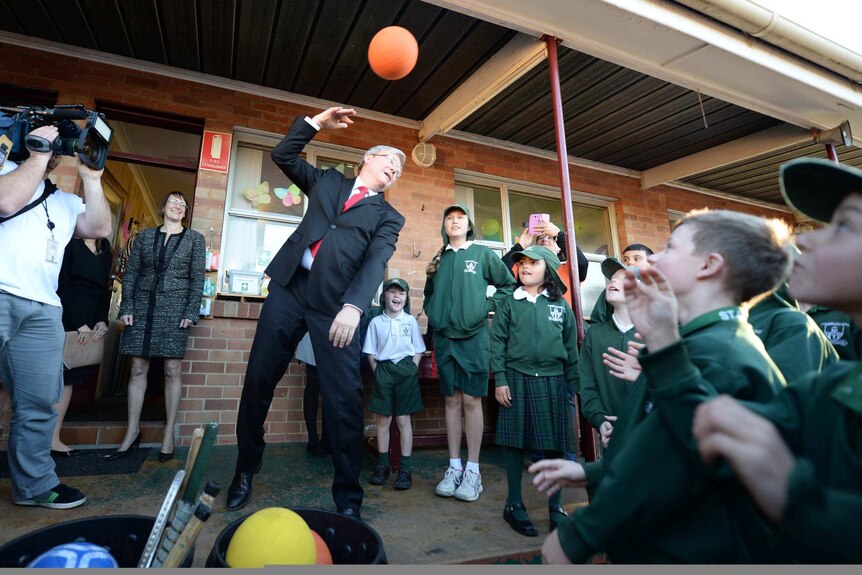 Rudd plays ball during Sydney school visit