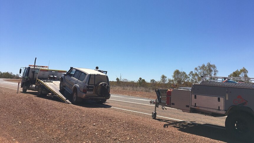 The Mifflin family's car had to be towed away for repairs in Central Australia.