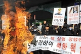 S Korea activists burn effigy of N Korean leader Kim Jong-Un