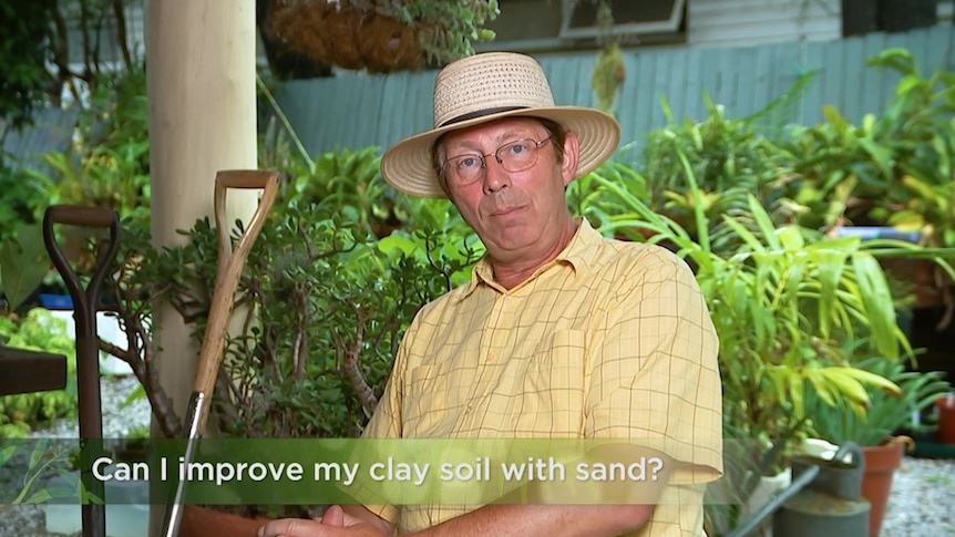 Gardening Australia's Jerry Coleby-Williams with graphic asking: "Can I improve my clay soil with sand?"