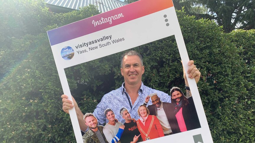 Yass Tourism's Sean Haylan with an instagram cut out