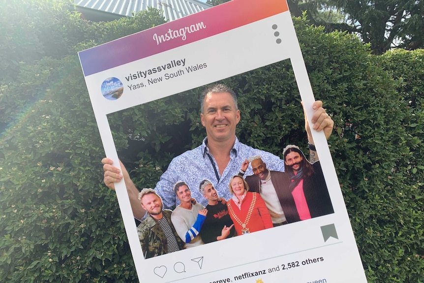 Yass Tourism's Sean Haylan with an instagram cut out