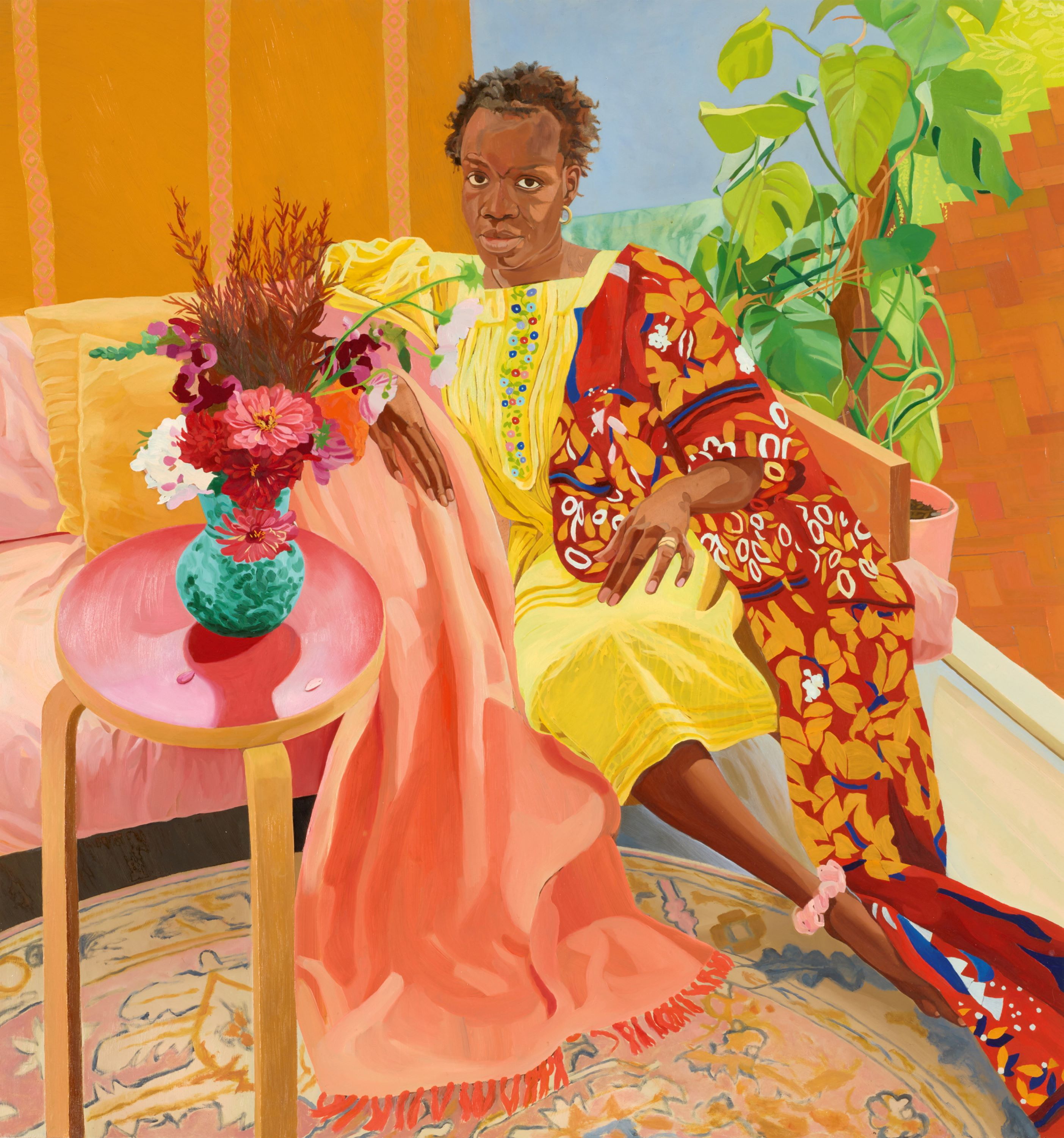 A painting of a young woman with short black hair, wearing a yellow dress and draped with a robe and blanket, sitting on a sofa