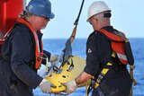 Towed pinger locator is deployed from Ocean Shield