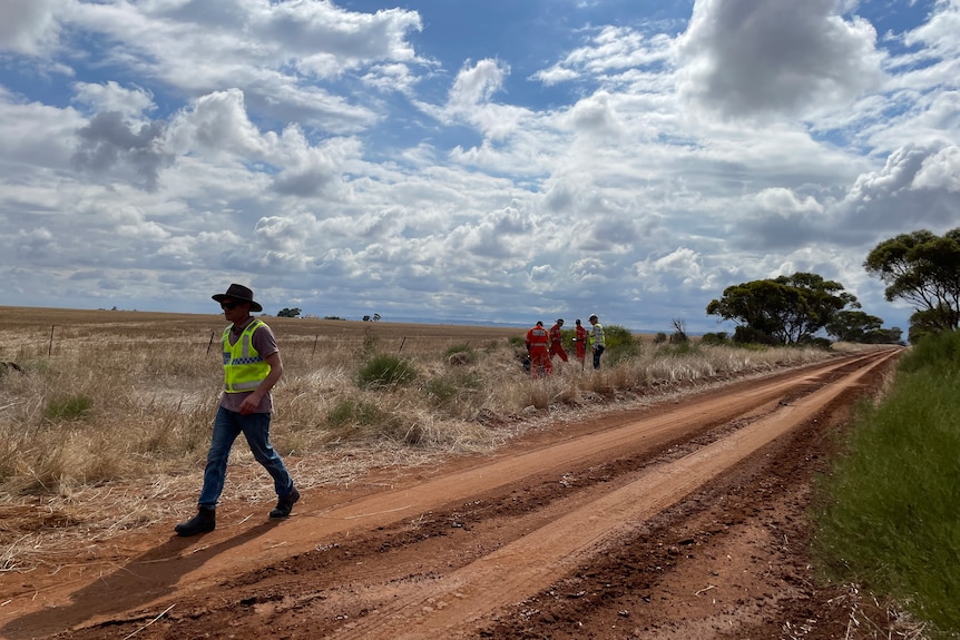 Volunteers searching for a body 