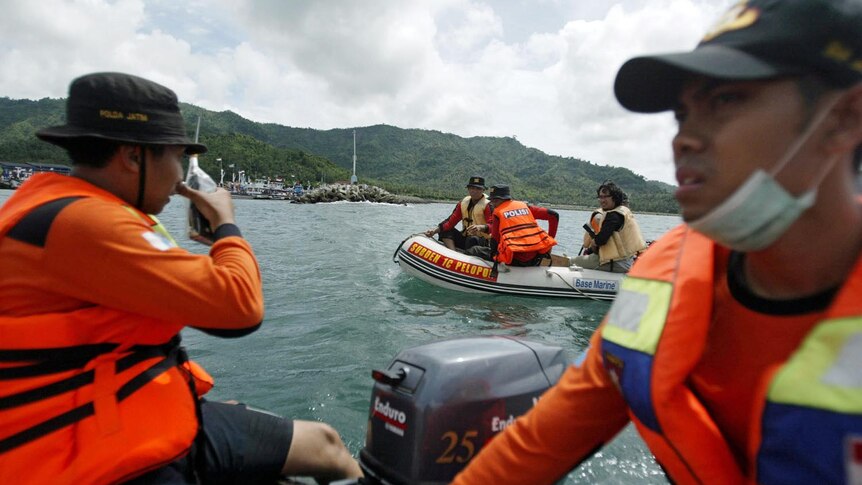 A search team looks for survivors from an asylum seeker boat that sank off the east Java coast.