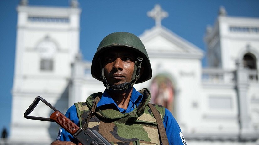 A security officer stands in front of St Anthony's shrine in Colombo, Sri Lanka.