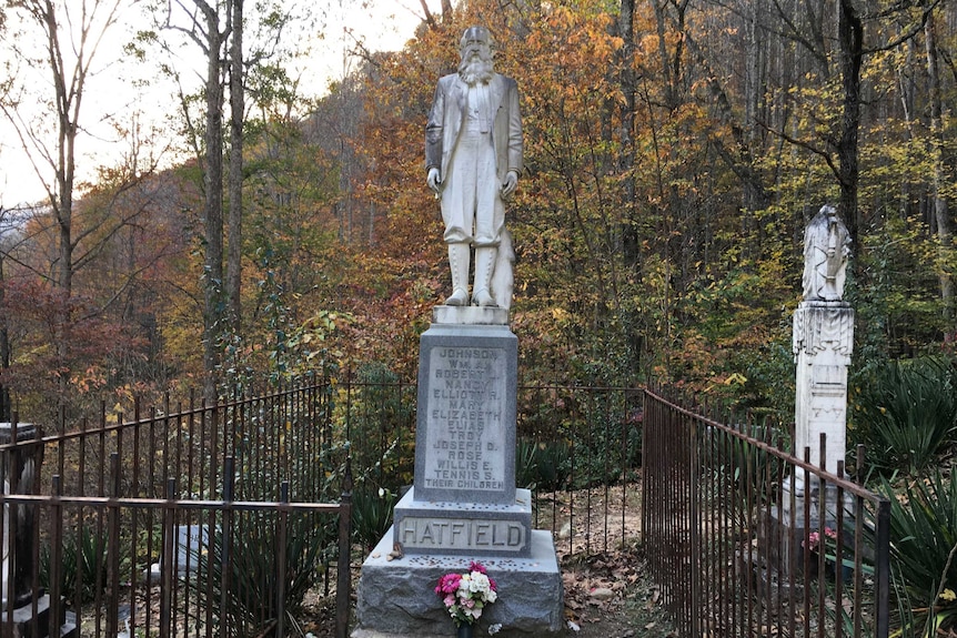 A headstone in the shape of William Anderson Hatfield in a graveyard in Logan County.