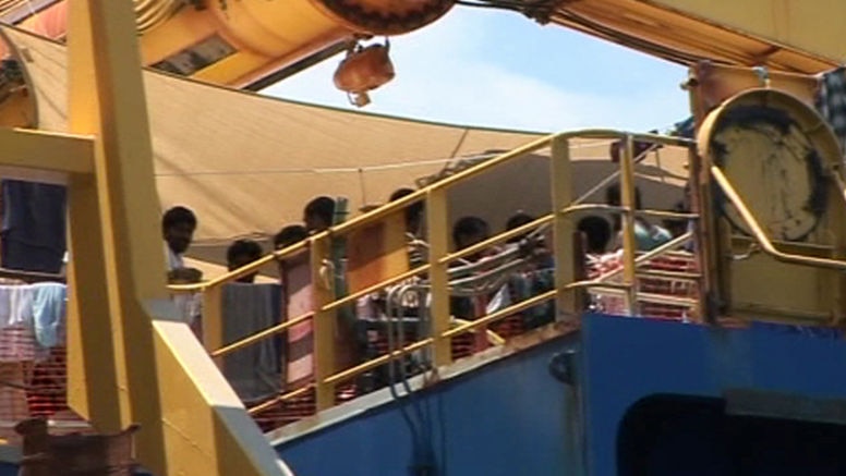 Asylum seekers hanging out washing on the Oceanic Viking.