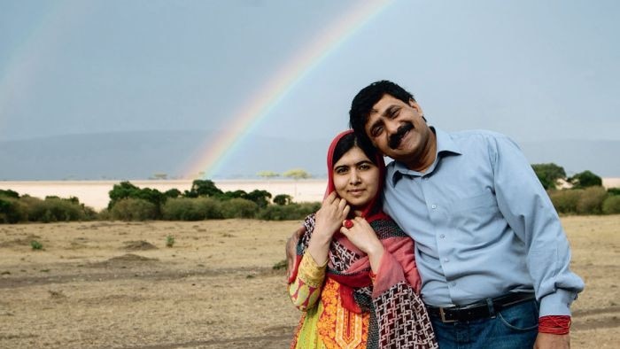 Ziauddin and Malala Yousafzai hugging.