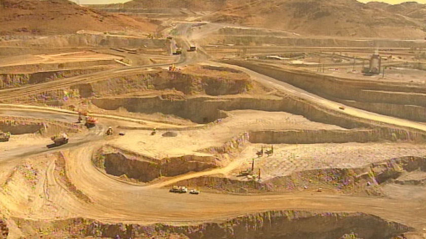 Generic aerial TV still of mining pit at unknown mine in Qld. Date unknown.