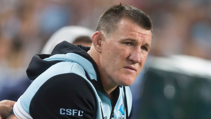 Paul Gallen sitting on the bench with his shoulder injury.