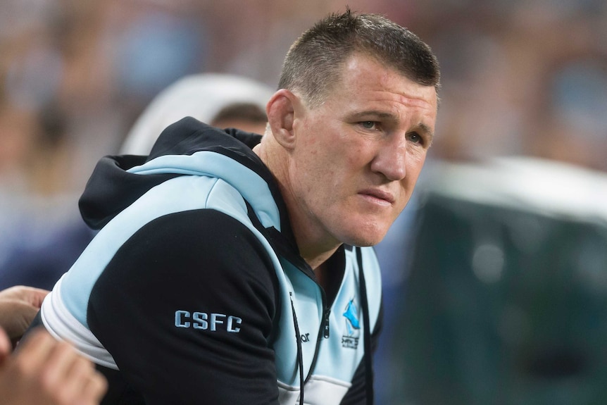 Paul Gallen sitting on the bench with his shoulder injury.