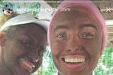 Two women pictured with blackface makeup.