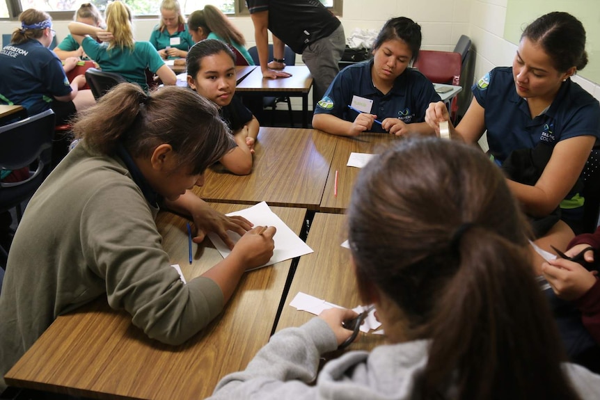 Students work on a project at the Power of Engineering workshop in Darwin.