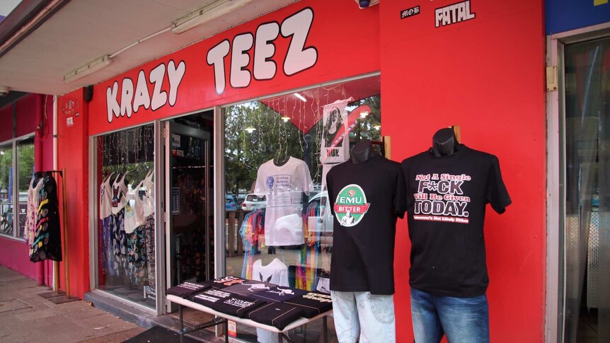 A shop front with t-shirts in the window