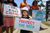 Three-year-old Joah Fanning amid an anti-Adani protest outside Proserpine Hospital in north Queensland