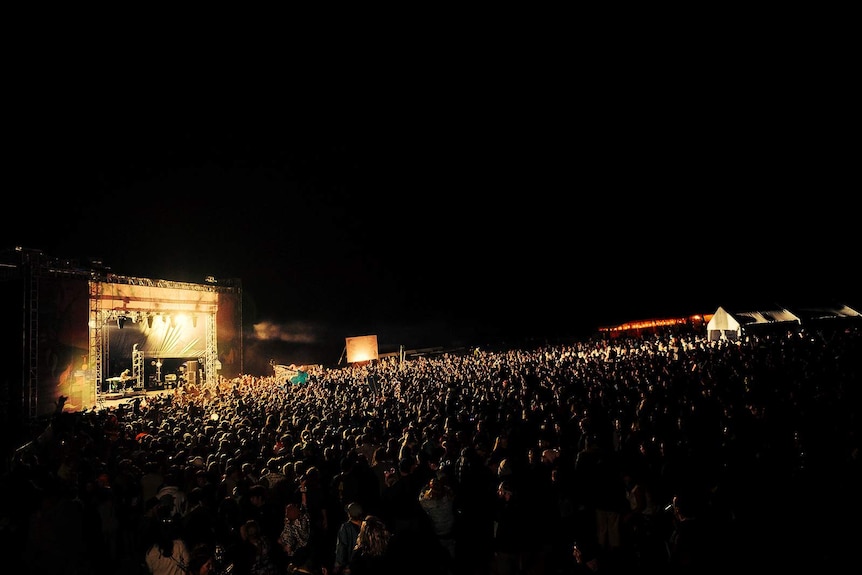 Thousands of people enjoying the 2019 Party in the Paddock festival at White Hills in Tasmania