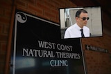 A composite image of Cabrera on top of another image of a sign of the West Coast Natural Therapies Clinic 