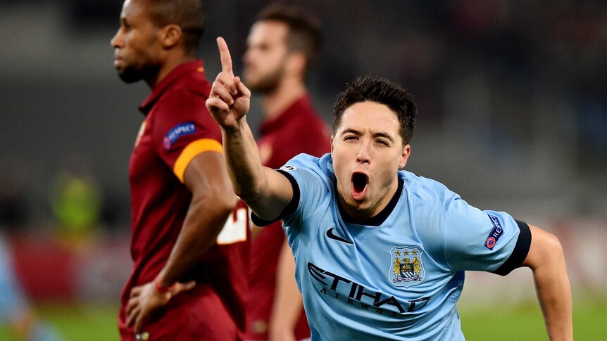 Manchester City's Samir Nasri celebrates a goal against AS Roma in the Champions League.