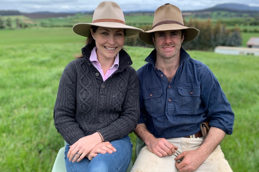 Photo of a woman and man in a paddock