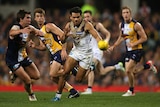 Andrew Gaff of West Coast and Hawthorn's Cyril Rioli contest the ball
