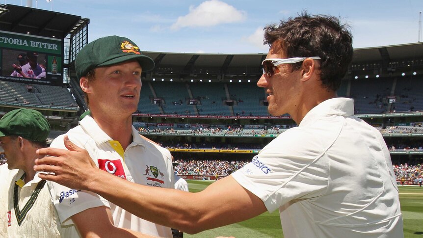 Mitchell Starc congratulates the man who replaced him, Jackson Bird, after Australia's MCG Test win.