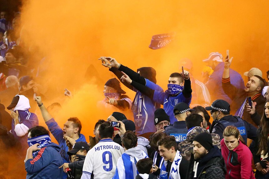 Greece fans set off flare at Docklands
