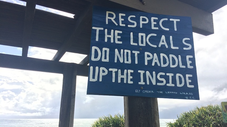 Sign saying "respect the locals, don't paddle up the inside' at Lennox Point.