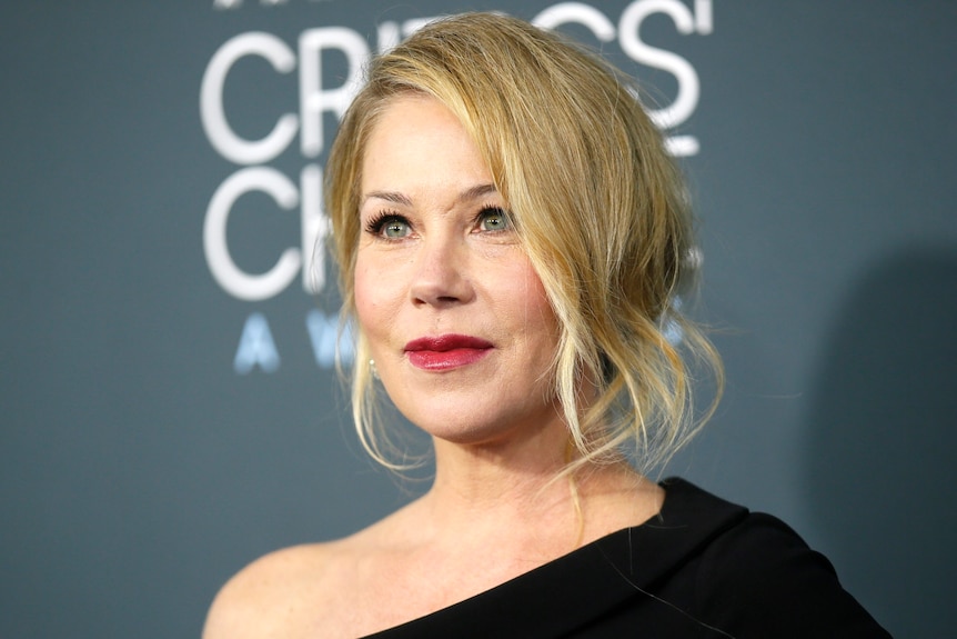 Christina Applegate smiles as she arrives at the 25th Critics Choice Awards in California.