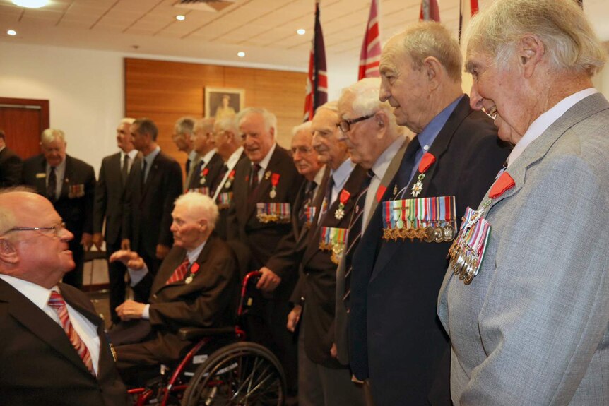 RSL president Graham Edwards with the French Legion of Honour recipients.