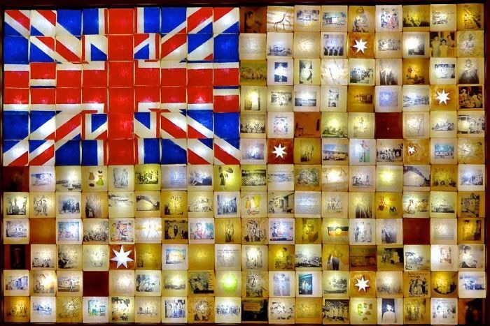 An artwork called Double Standards, depicting an Australian flag made up of images of Aboriginal Australia.