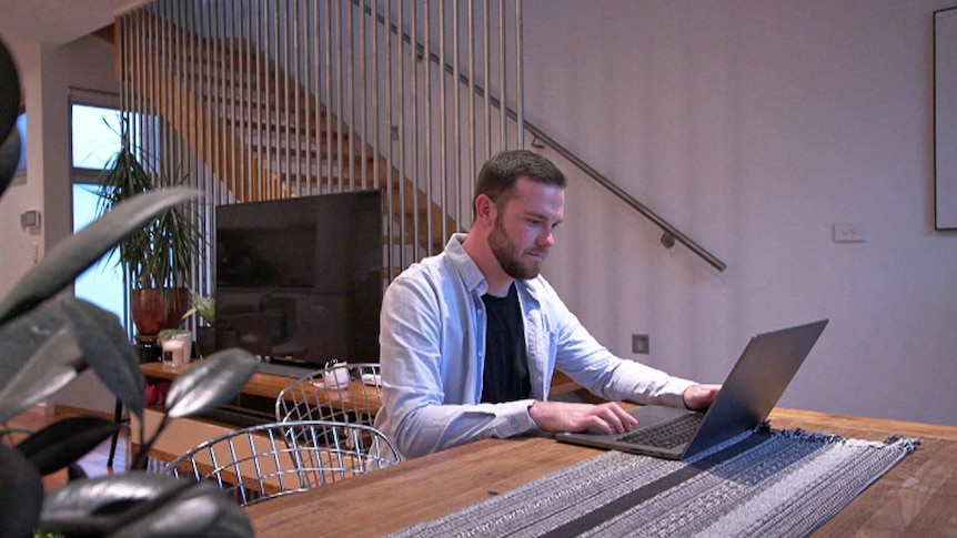 Shane Le Beau at desk