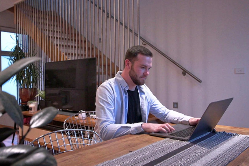 Shane Le Beau at desk