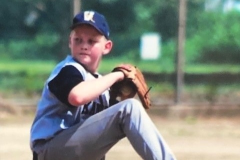 boy playing baseball